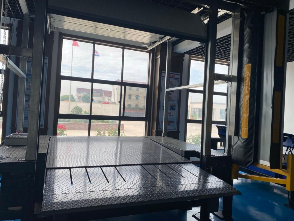 Overview of Geajie's facility's production line, focusing on the assembly of retractable hydraulic platforms and dock seals.