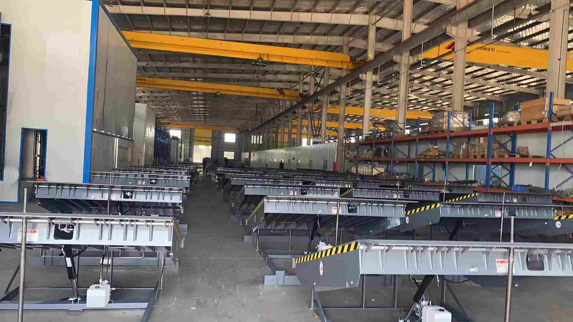 GEAJIE dock leveler installation bay showing professional pit mounting and testing process